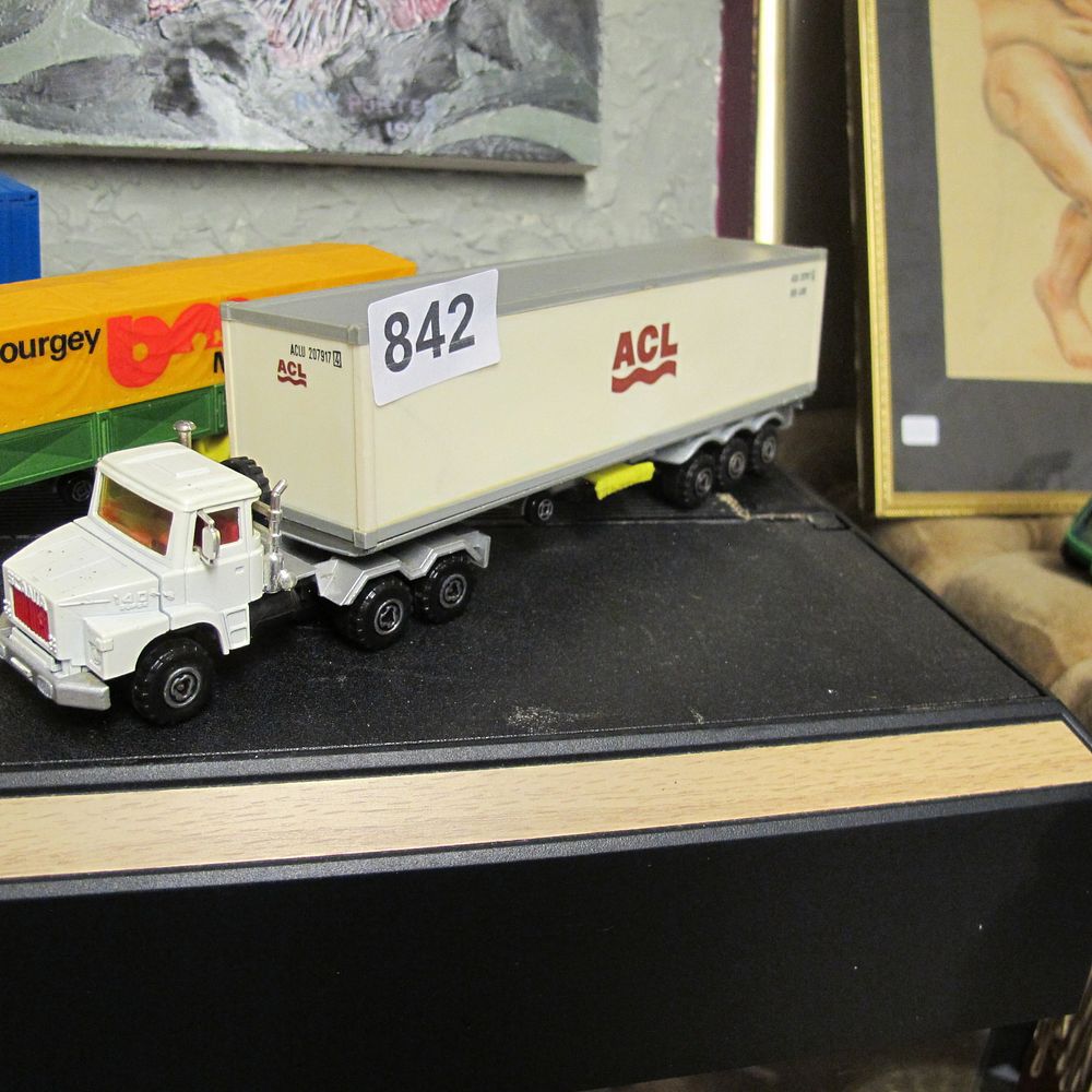 Lot 842: A Die-Cast Model Vehicle Including a Scania Tractor-Trailer...