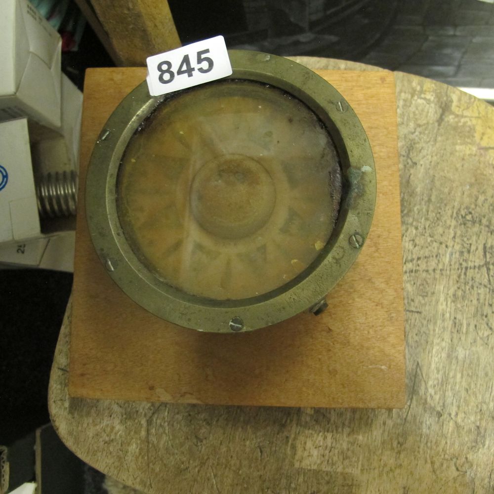 Lot 845: A Vintage Brass Nautical Compass on Wooden Plinth