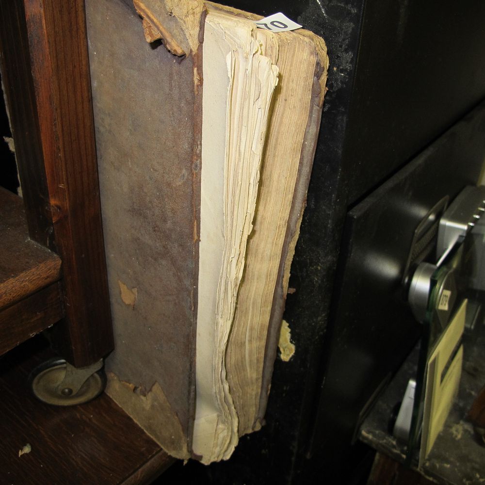 Lot 870: An Antique Large-Format Leather-Bound Volume