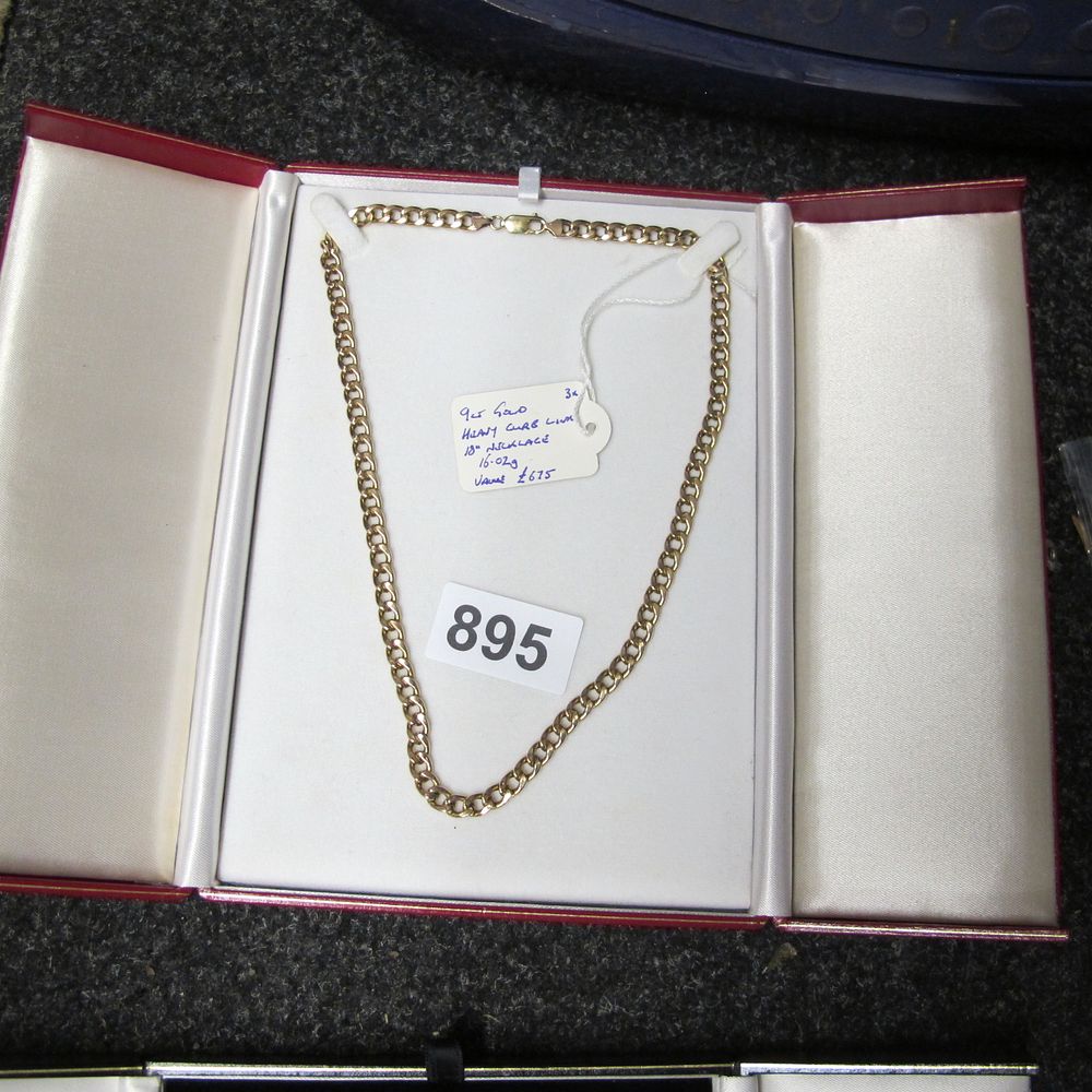 Lot 895: A 9ct Yellow Gold Heavy Curb Link 18"...