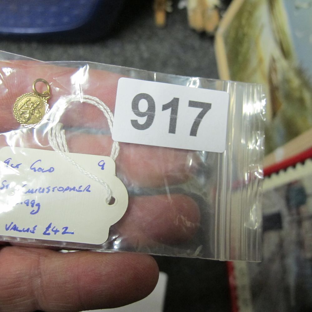 Lot 917: A 9-Karat Gold St. Christopher Pendant 0.99g Scrap...