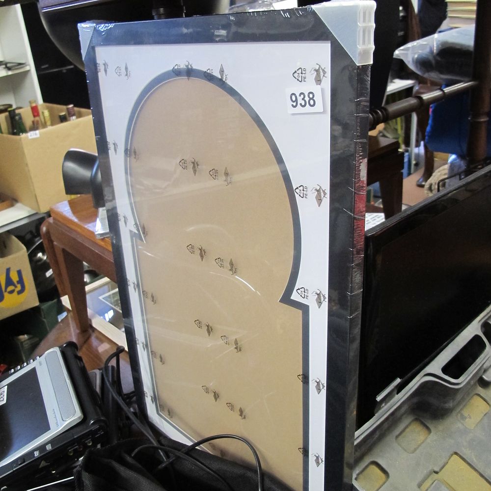 Lot 938: A Contemporary Black-Framed Picture Display with Stylised Double-Circular...