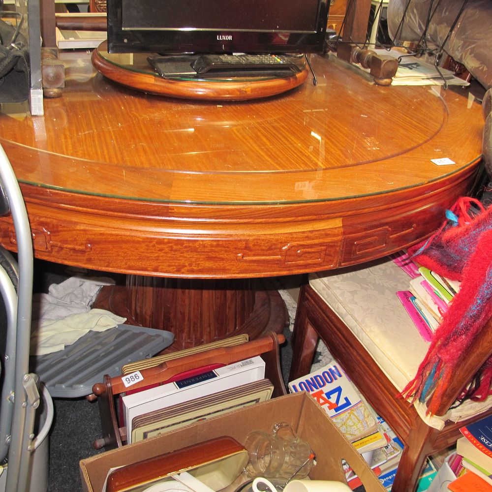 Lot 941: A Rosewood Round Ming Dining Table with Lazy...