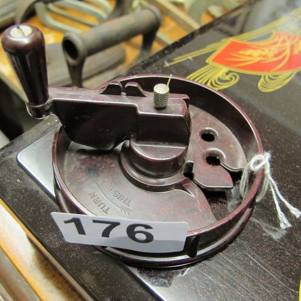 Lot 176: A Mid-20th Century Bakelite Hand-Crank rug wool cutting/crafting...