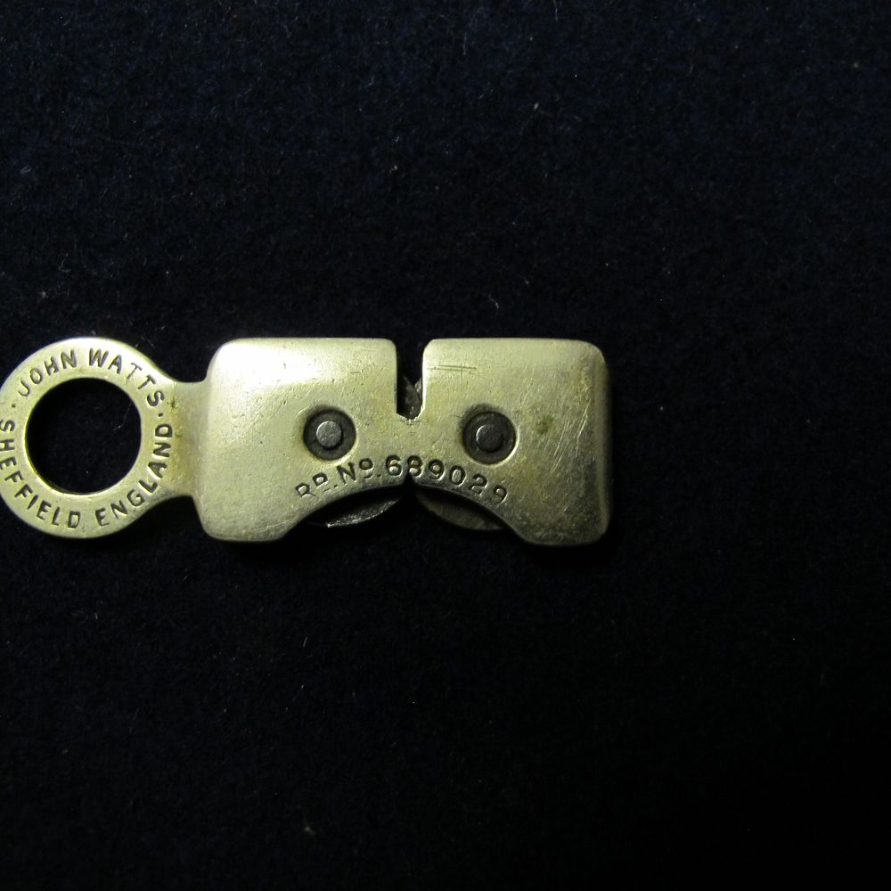 Lot 181: A John Watts Nickel-Plated Steel Pocket Knife Sharpener
