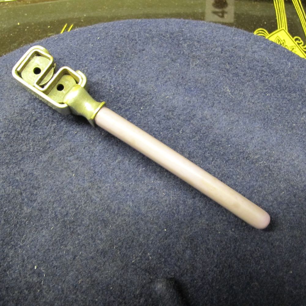 Lot 187: A Mid-Century Pull-Through Knife Sharpener with Ceramic Rod...