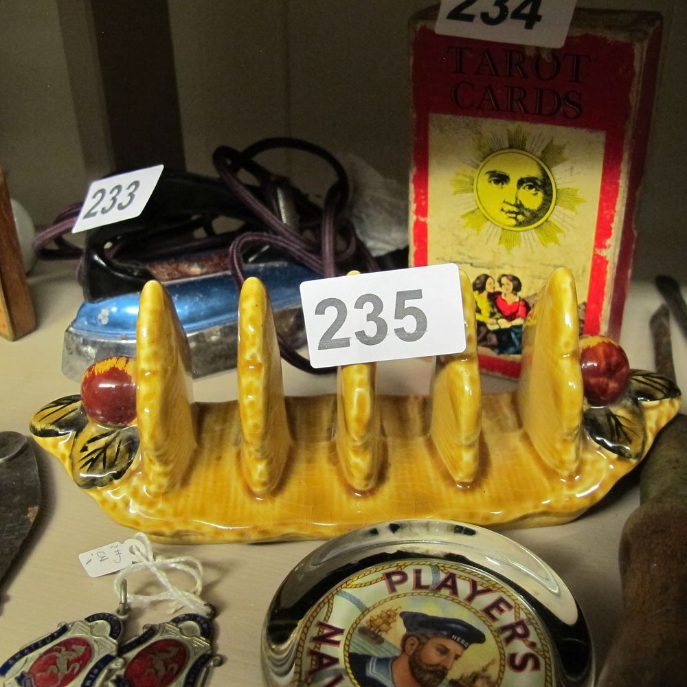 Lot 235: Mid-20th Century English Glazed Earthenware Four-Slot Toast Rack
