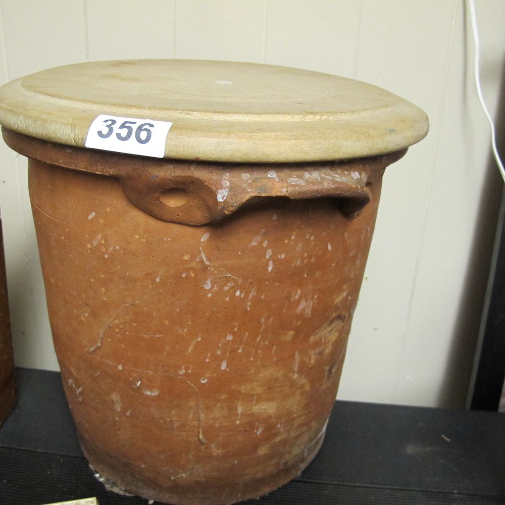 Lot 356: A Late 19th or Early 20th-Century Terracotta Storage...