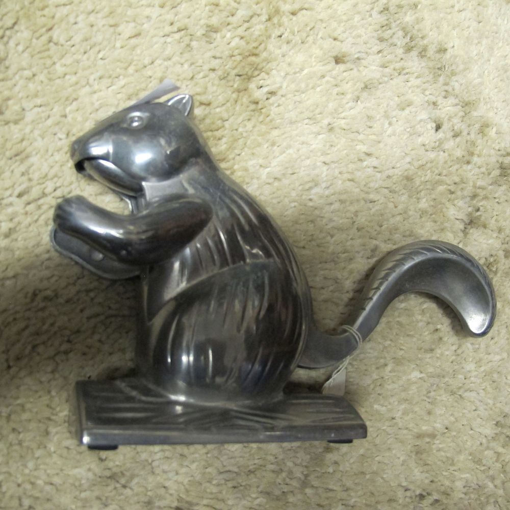 Lot 390: A cast aluminium figural squirrel nutcracker