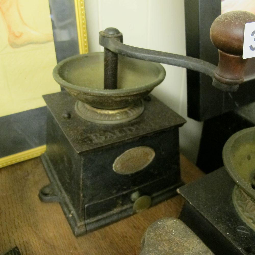 Lot 394: A vintage Baldwin Cast Iron Coffee Grinder