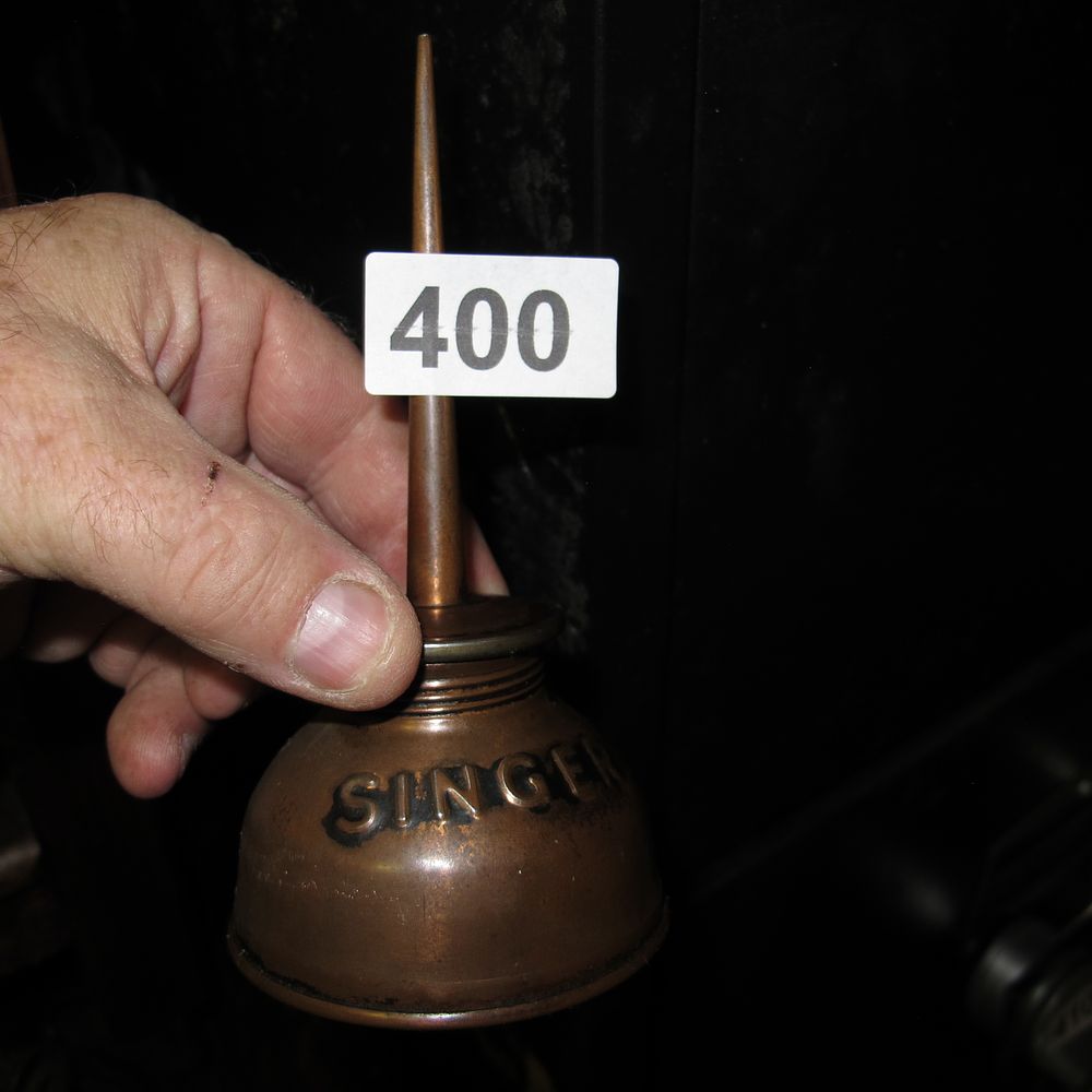Lot 400: A Vintage Singer Copper-Toned Sewing Machine Oil Can