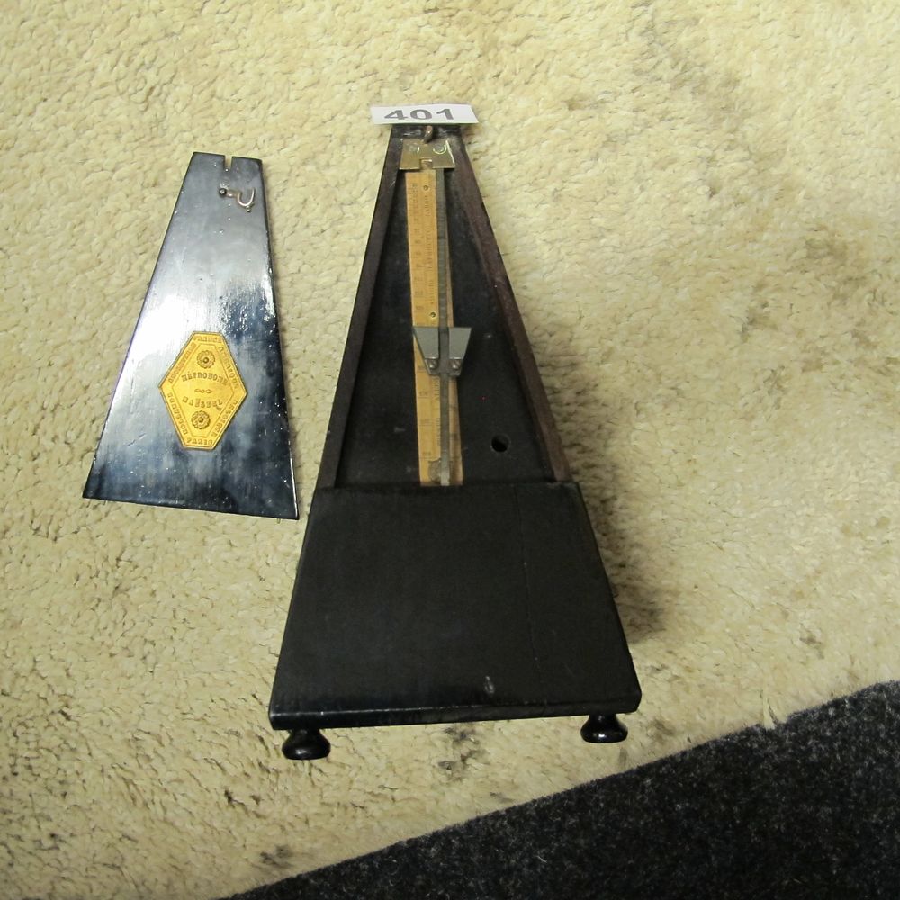 Lot 401: A French Ebonised Wood Metronome de Maelzel