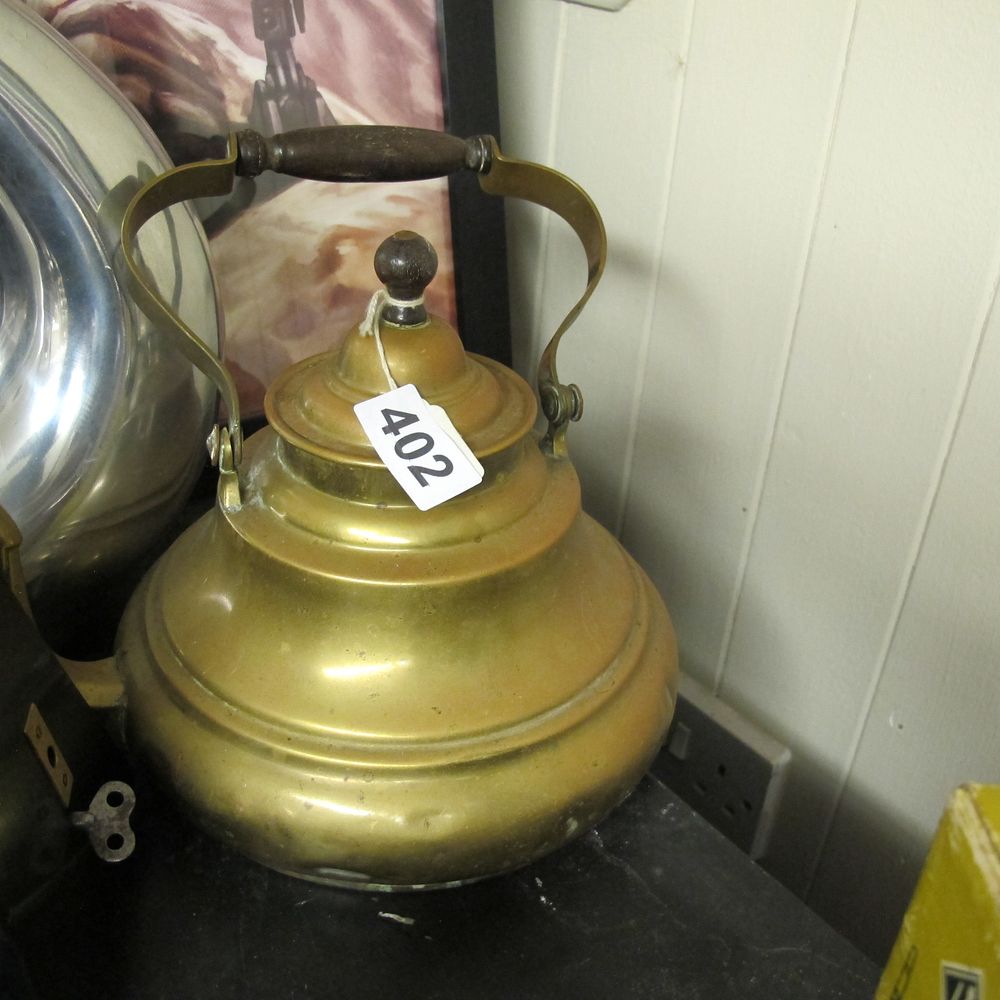 Lot 402: A Late 19th Century Brass Kettle with Turned...