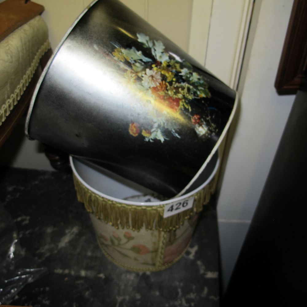 Lot 426: Two decorative waste paper bins including a toleware...