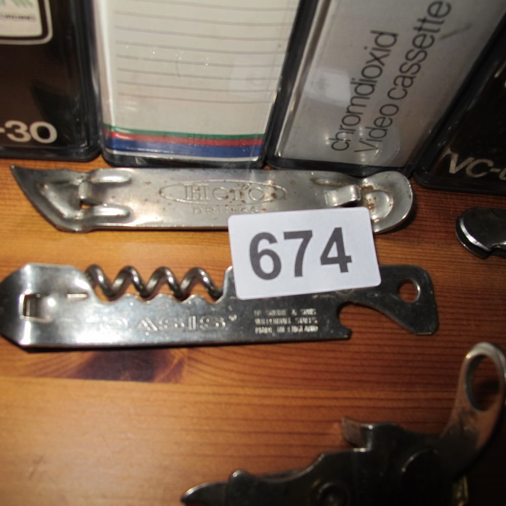 Lot 674: Two Vintage Promotional Steel Bottle Openers including W....