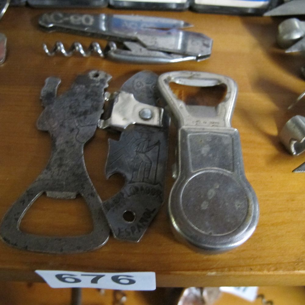 Lot 676: An Assortment of Vintage Bar Tools and Bottle...