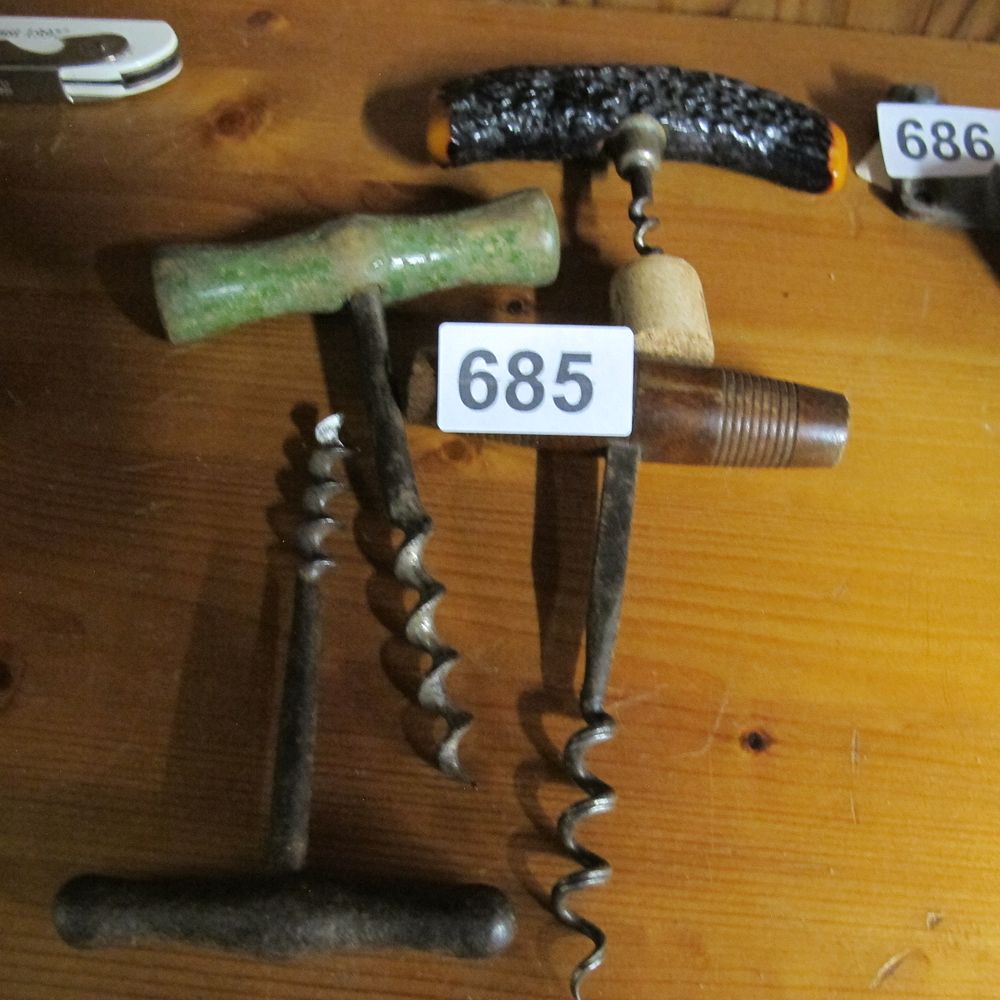 Lot 685: A Group of Vintage and Antique T-handle Corkscrews