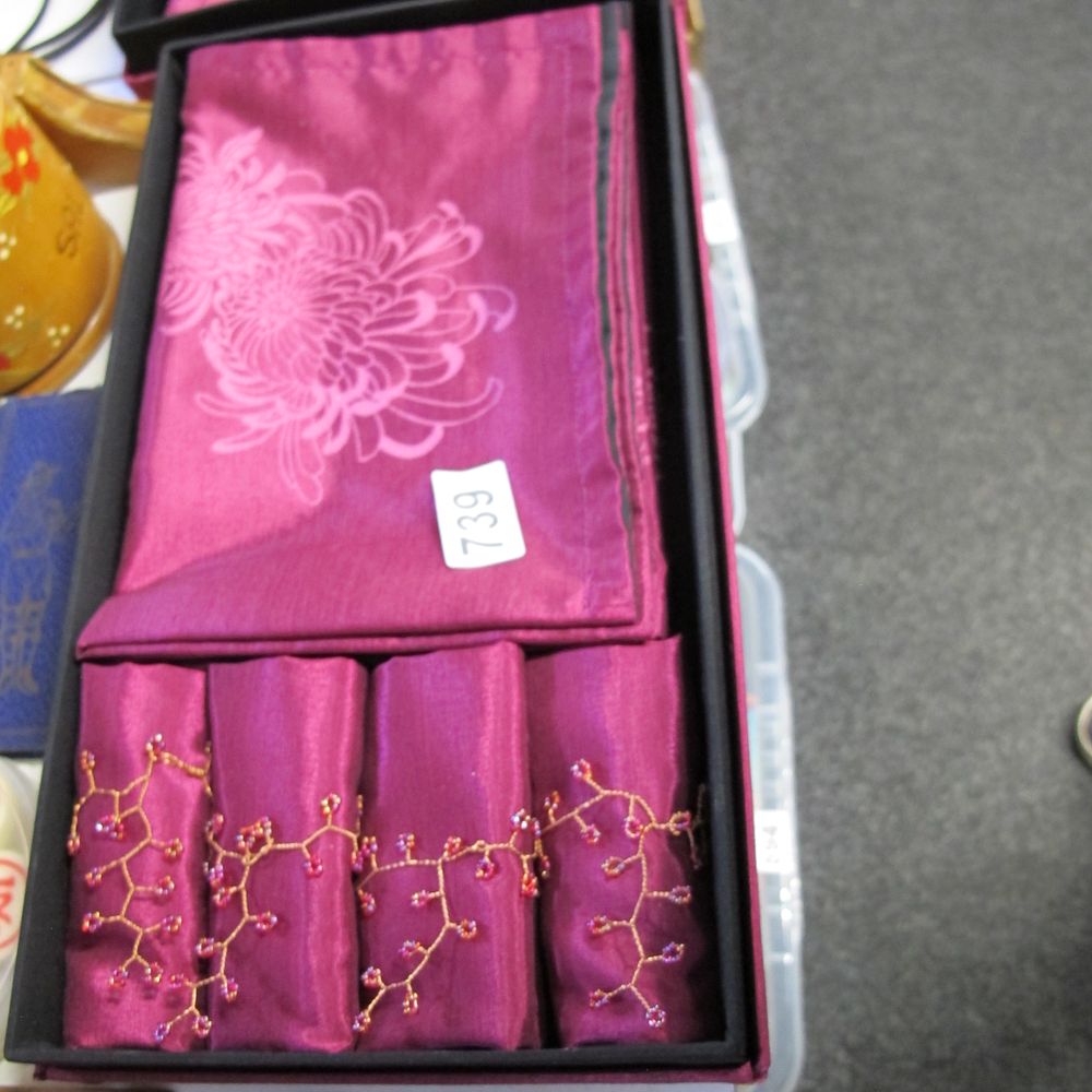 Lot 739: A Set of Magenta Silk-Effect Table Linens in...