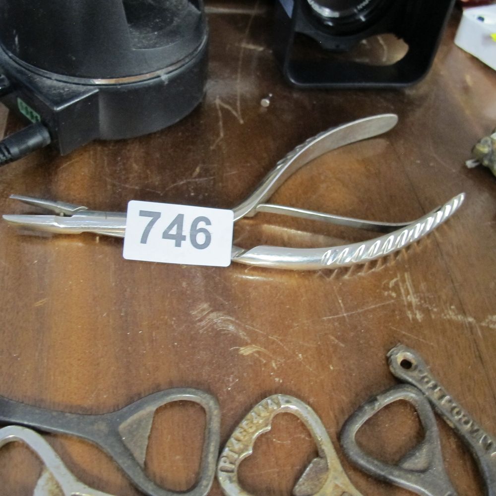 Lot 746: A Pair of Surgical Forceps and a Collection...