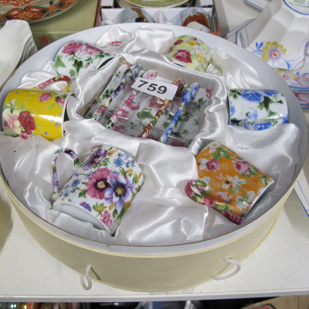 Lot 759: A Set of Six Fine Bone China Floral...