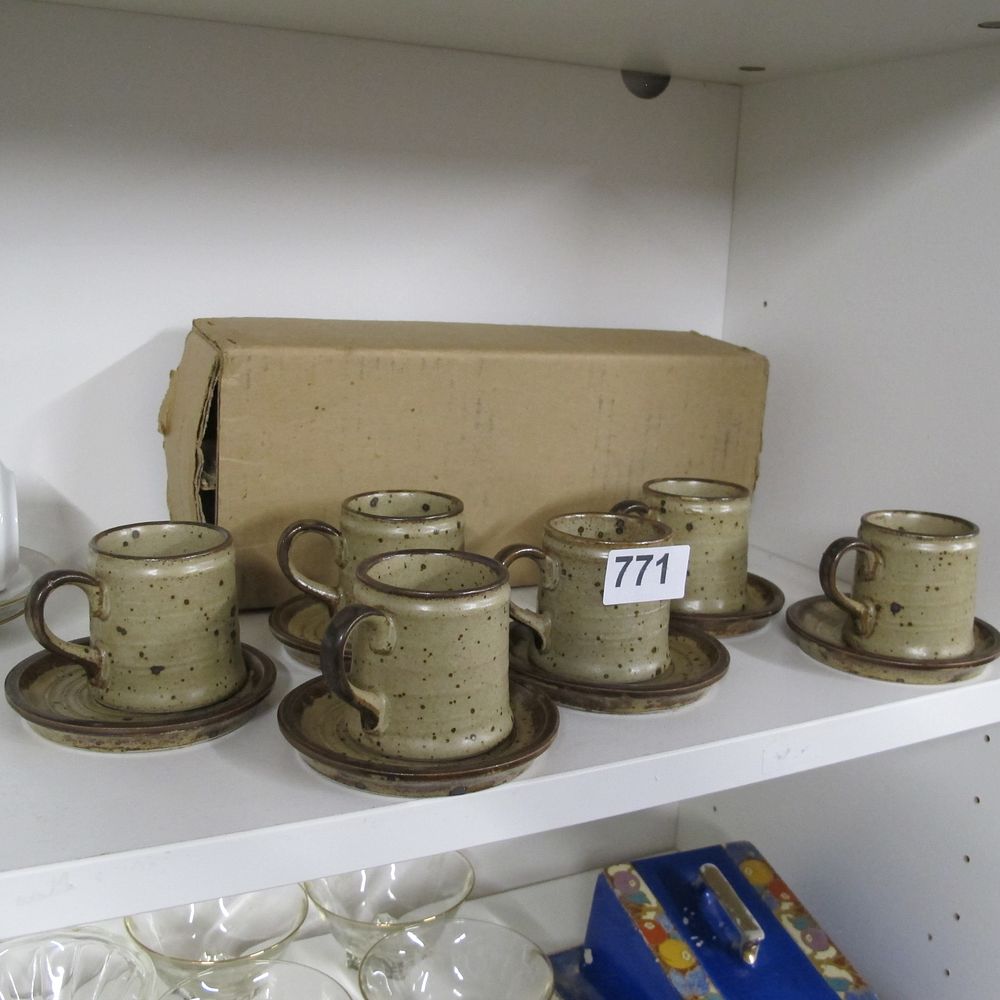 Lot 771: A set of six mid-20th-century stoneware coffee cups...