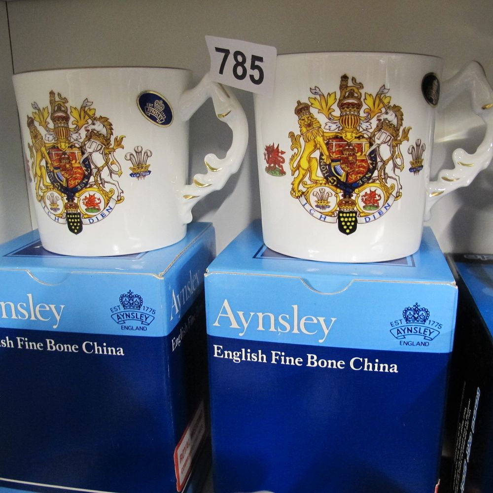 Lot 785: A pair of Aynsley fine bone china mugs...