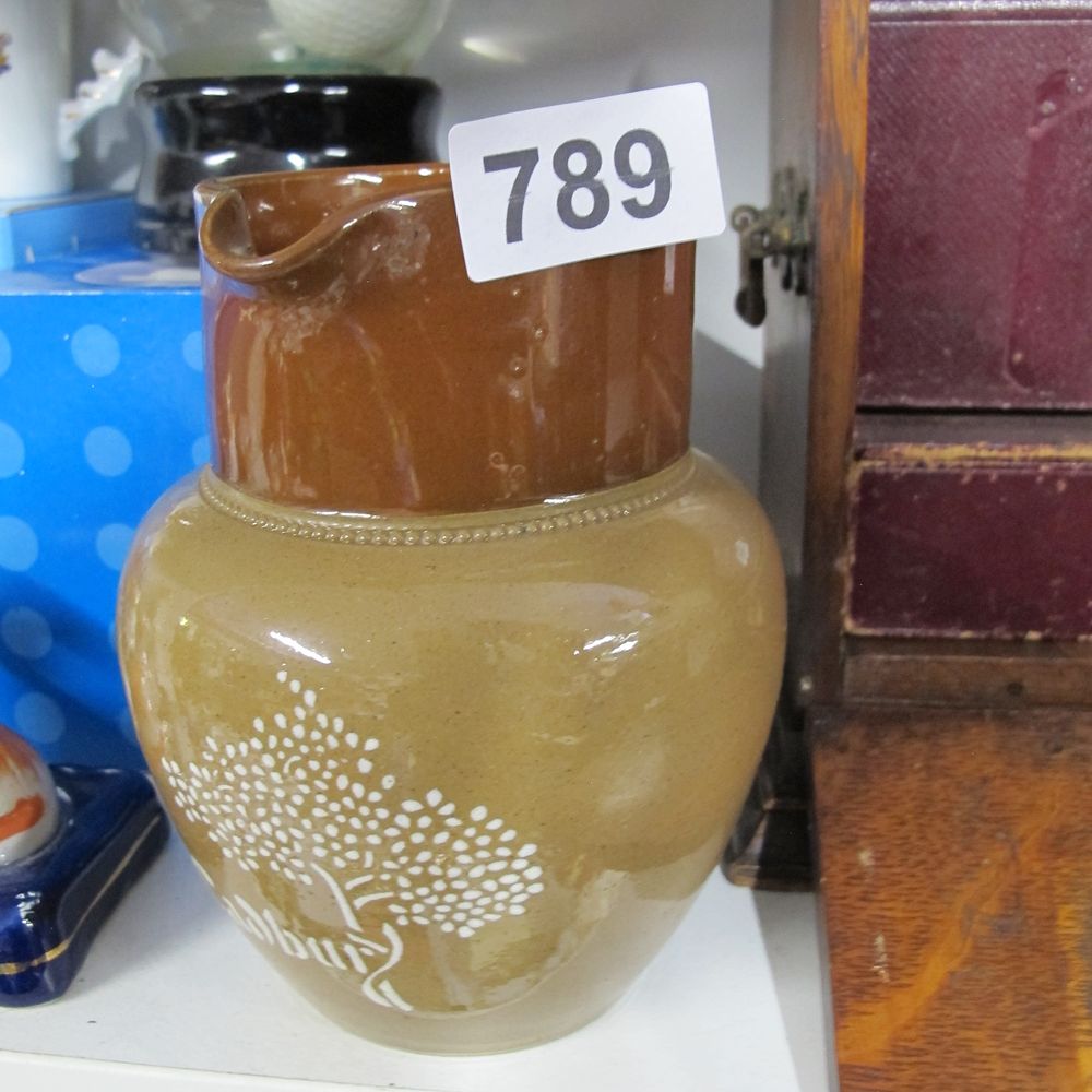 Lot 789: A Cadbury Cocoa Two-Tone Salt-Glazed Stoneware Jug