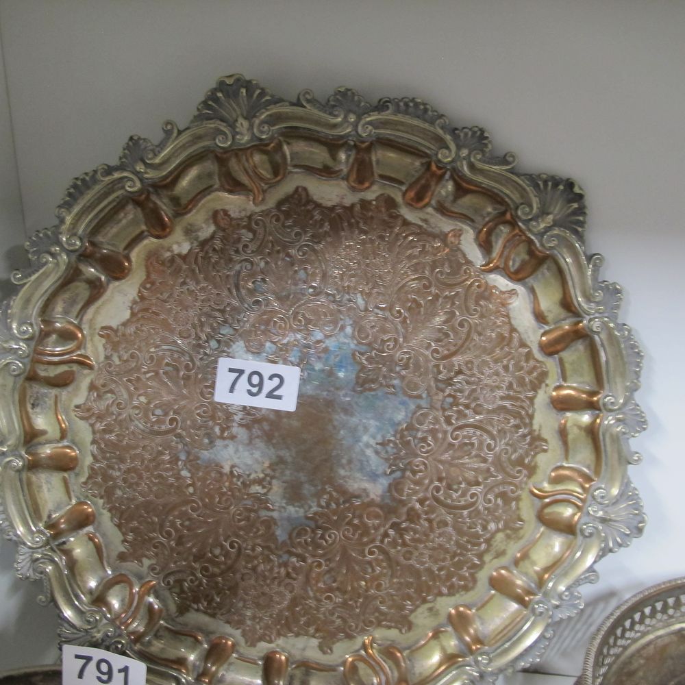 Lot 792: A Victorian Rococo Revival silver-plated on copper circular...