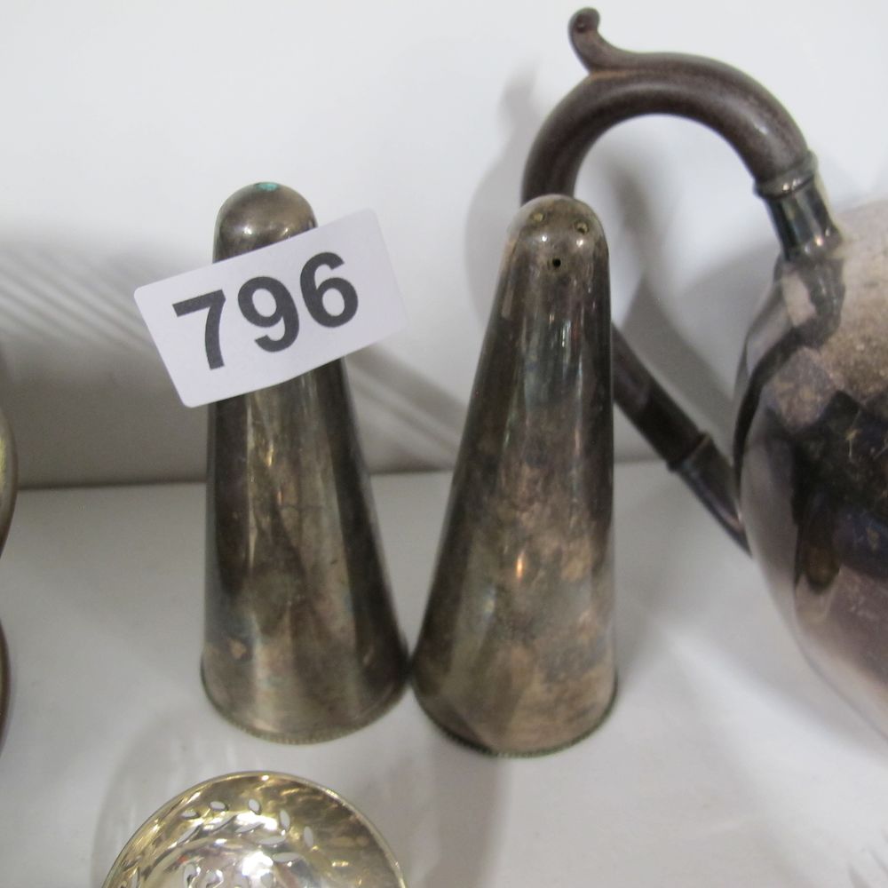 Lot 796: A Pair of Modernist Conical Silver-Plated Salt and...