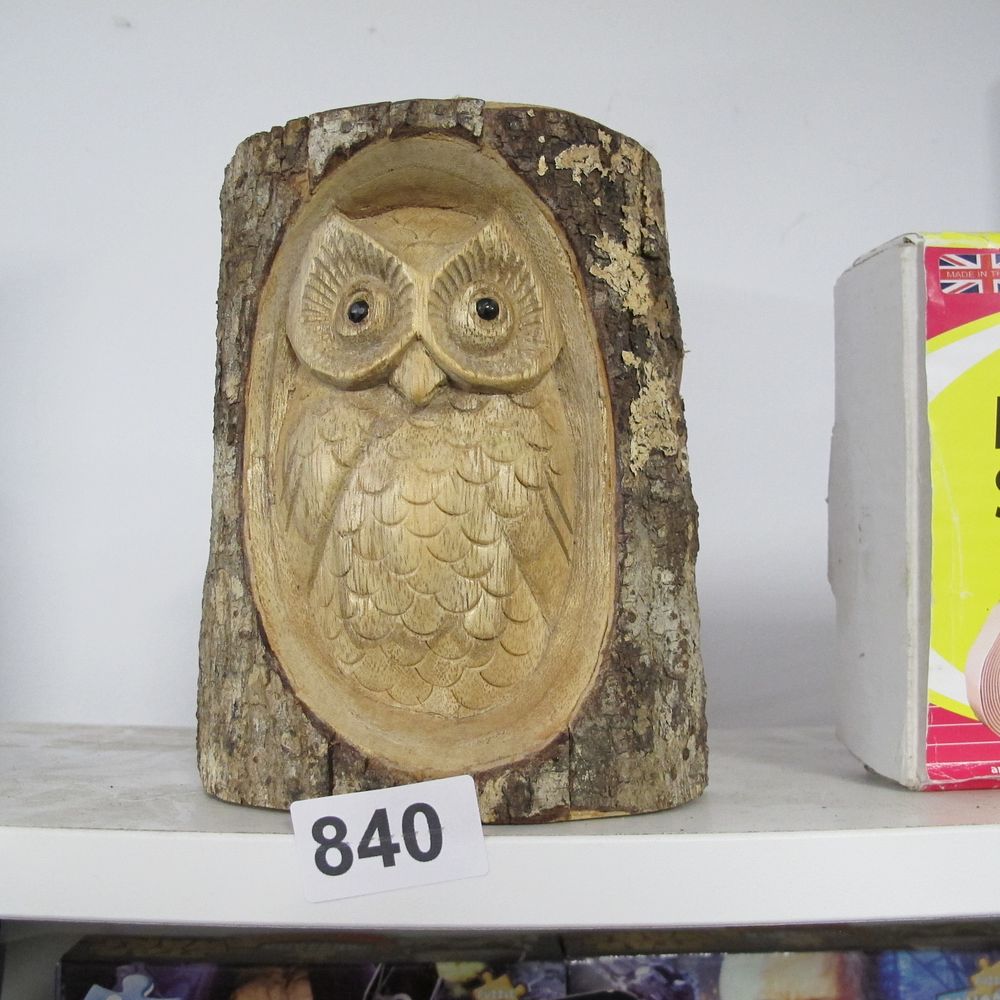 Lot 840: A hand-carved wooden owl relief in a natural...