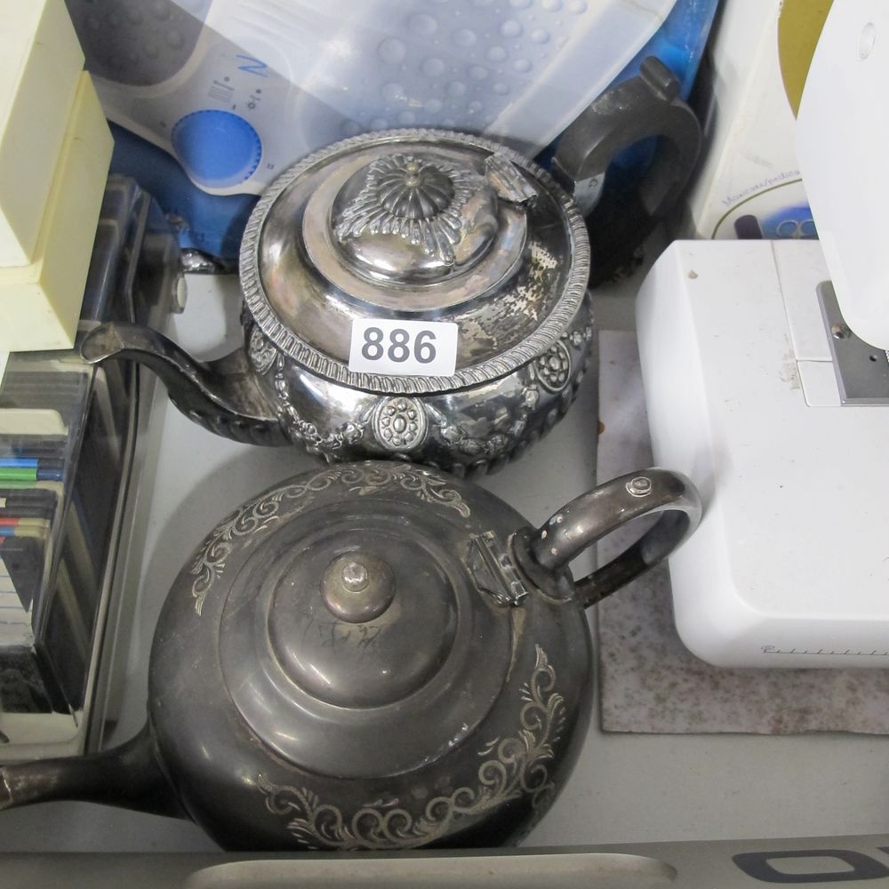 Lot 886: Two Victorian style silver plated teapots