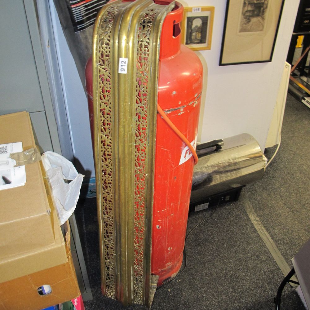 Lot 912: Victorian Style Pierced Brass Fireplace Fender