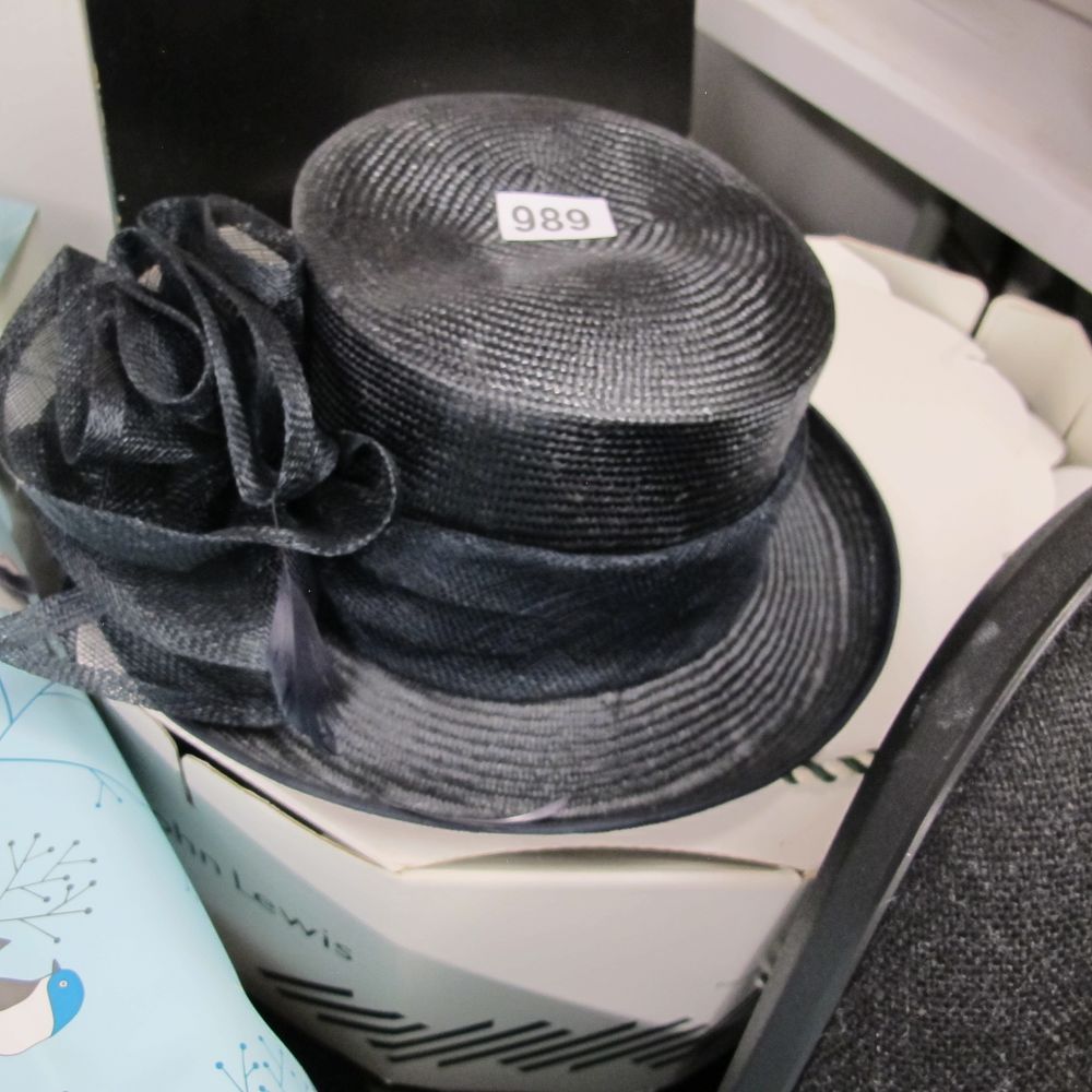 Lot 989: A John Lewis Navy Blue Sinamay Dress Hat