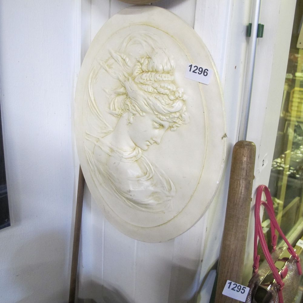 Lot 1296: A Neo-classical style oval relief plaque depicting a...