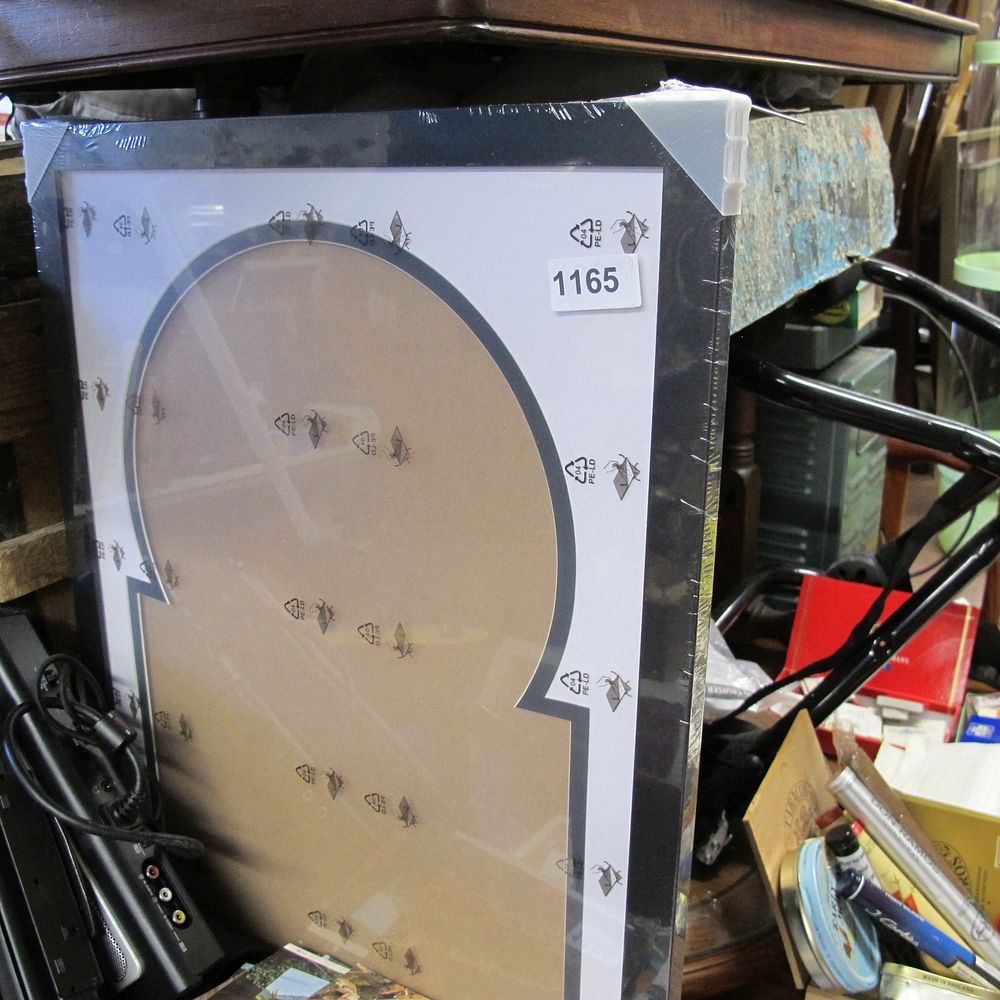Lot 1165: A contemporary black-finished picture frame with a specialized...