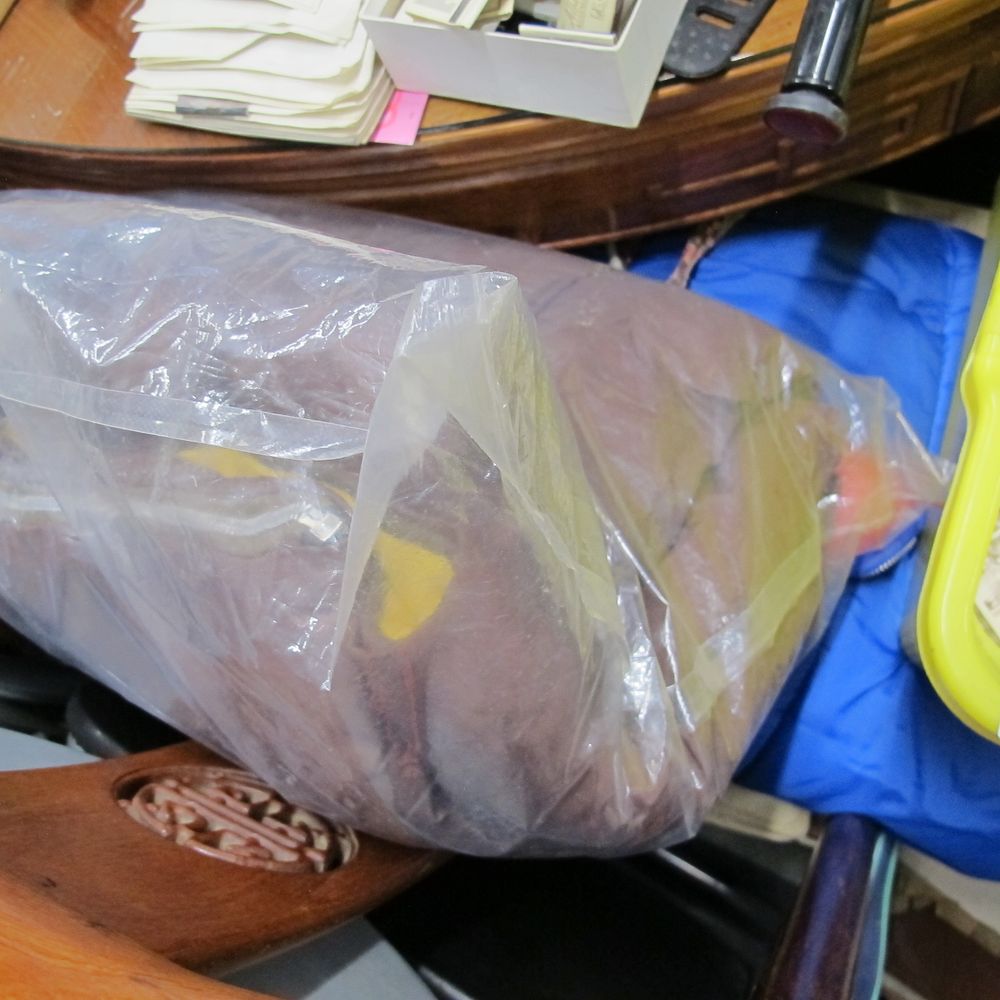 Lot 1174: Large Burgundy Textile Item in Protective Storage Bag