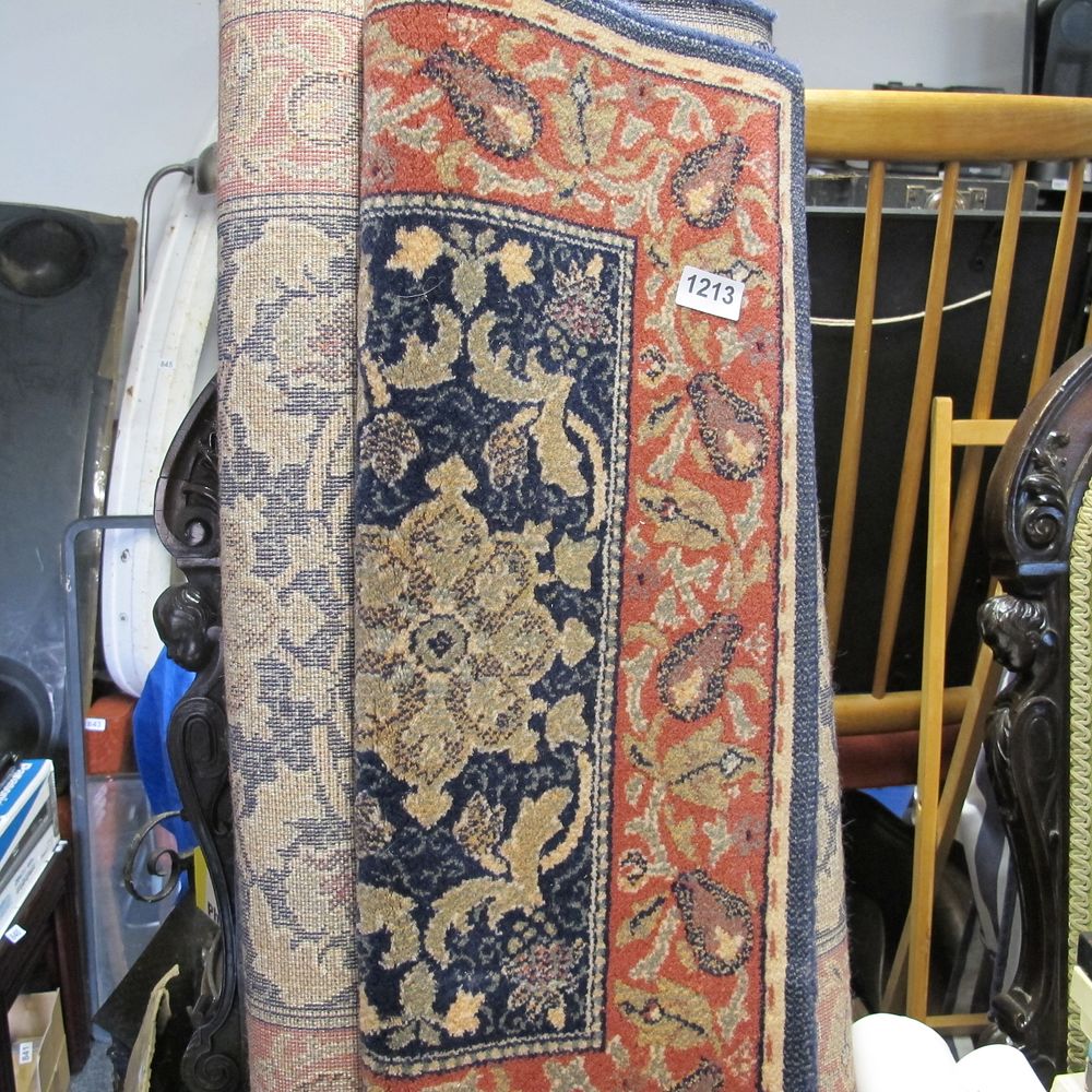 Lot 1213: A Machine-Woven Persian Style Medallion Rug