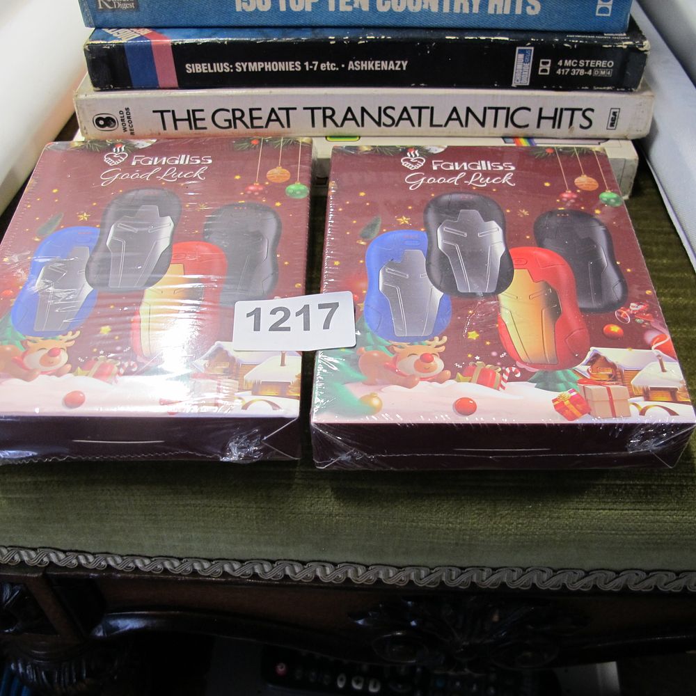 Lot 1217: A Pair of Fandliss Good Luck Rechargeable Hand...