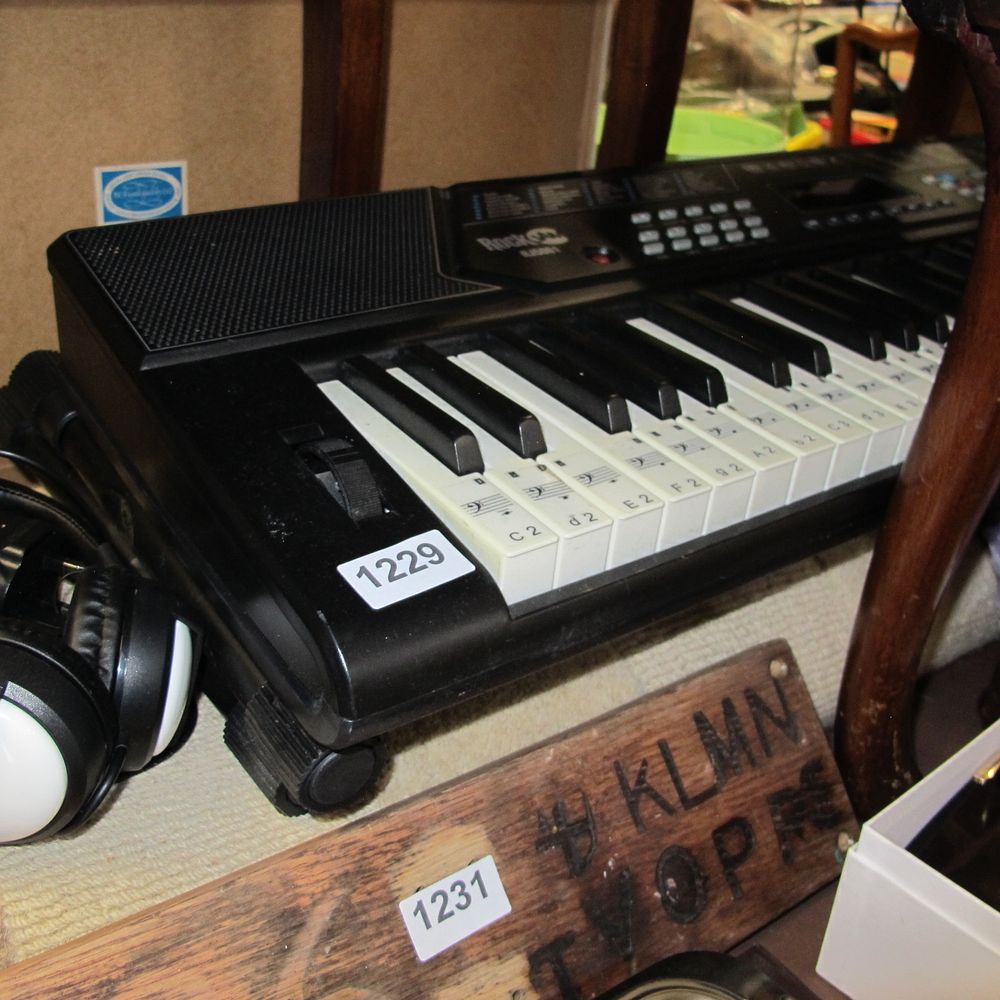 Lot 1229: A Trio of Items Comprising a RockJam RJ5061...