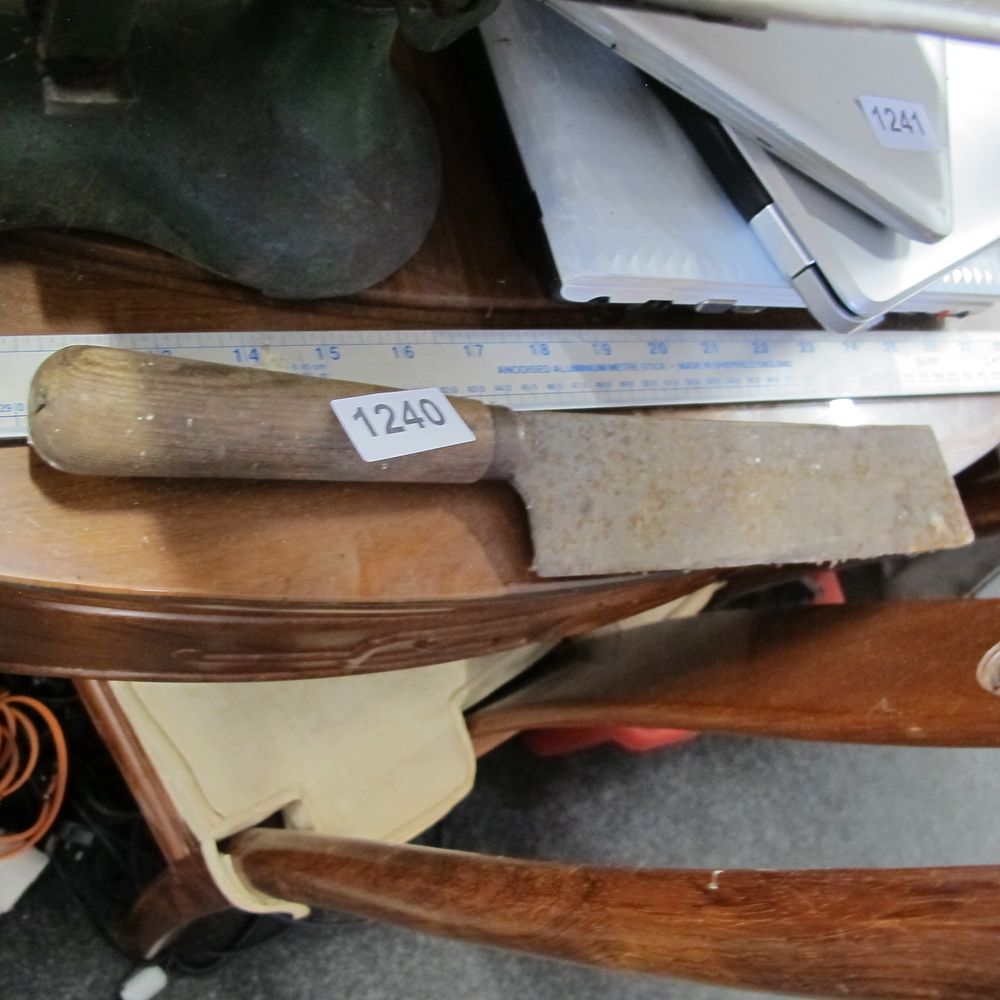 Lot 1240: A vintage small rectangular carbon steel cleaver with...