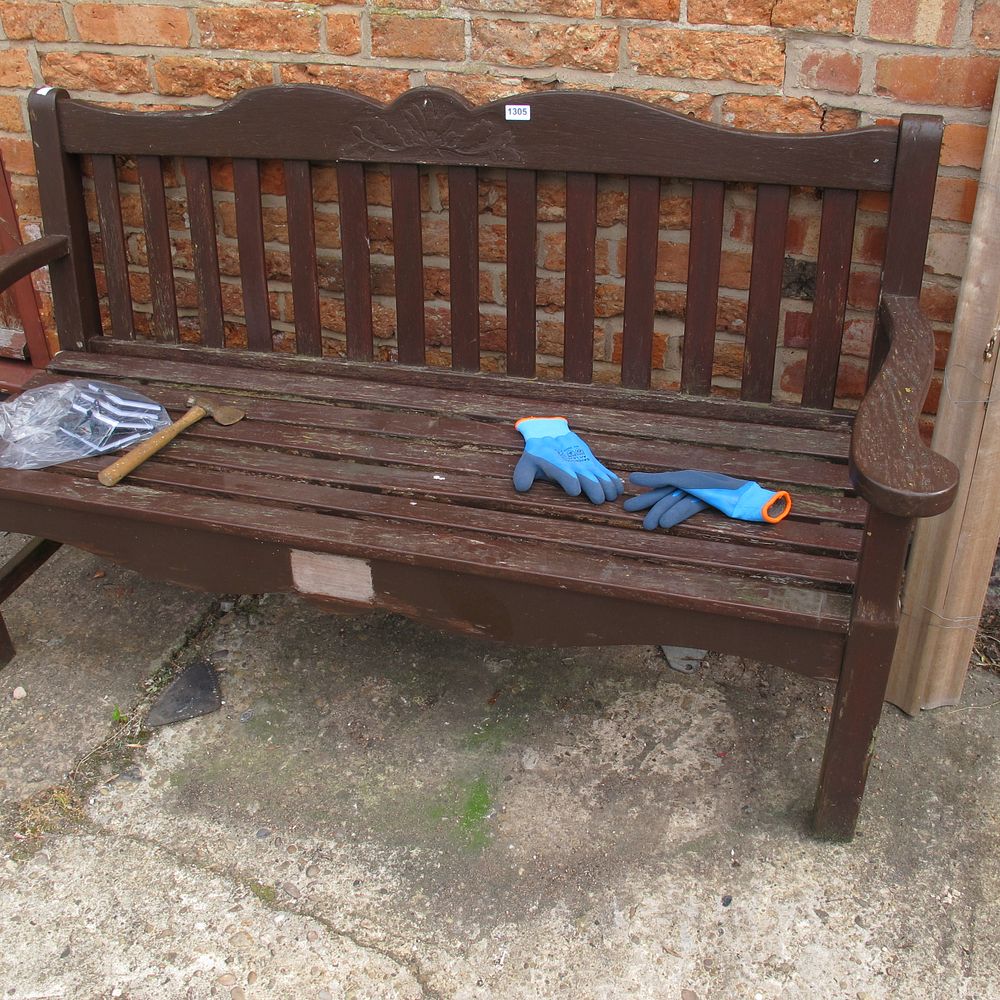 Lot 1305: A Traditional Carved Hardwood Garden Bench