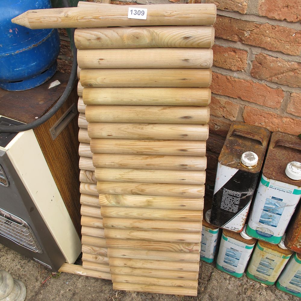 Lot 1309: A Collection of Wooden Garden Log Edging and...