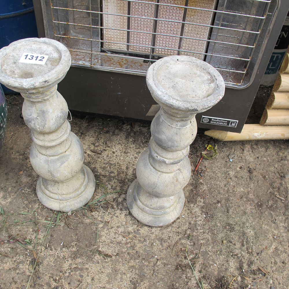 Lot 1312: A Pair of Weathered Reconstituted Stone Baluster-Form Plinths