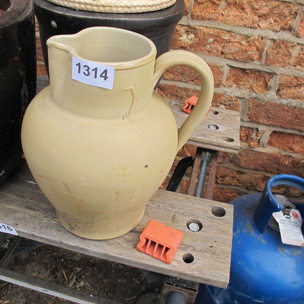 Lot 1314: A Large Late 19th Century Buff-Glazed Stoneware Utility...