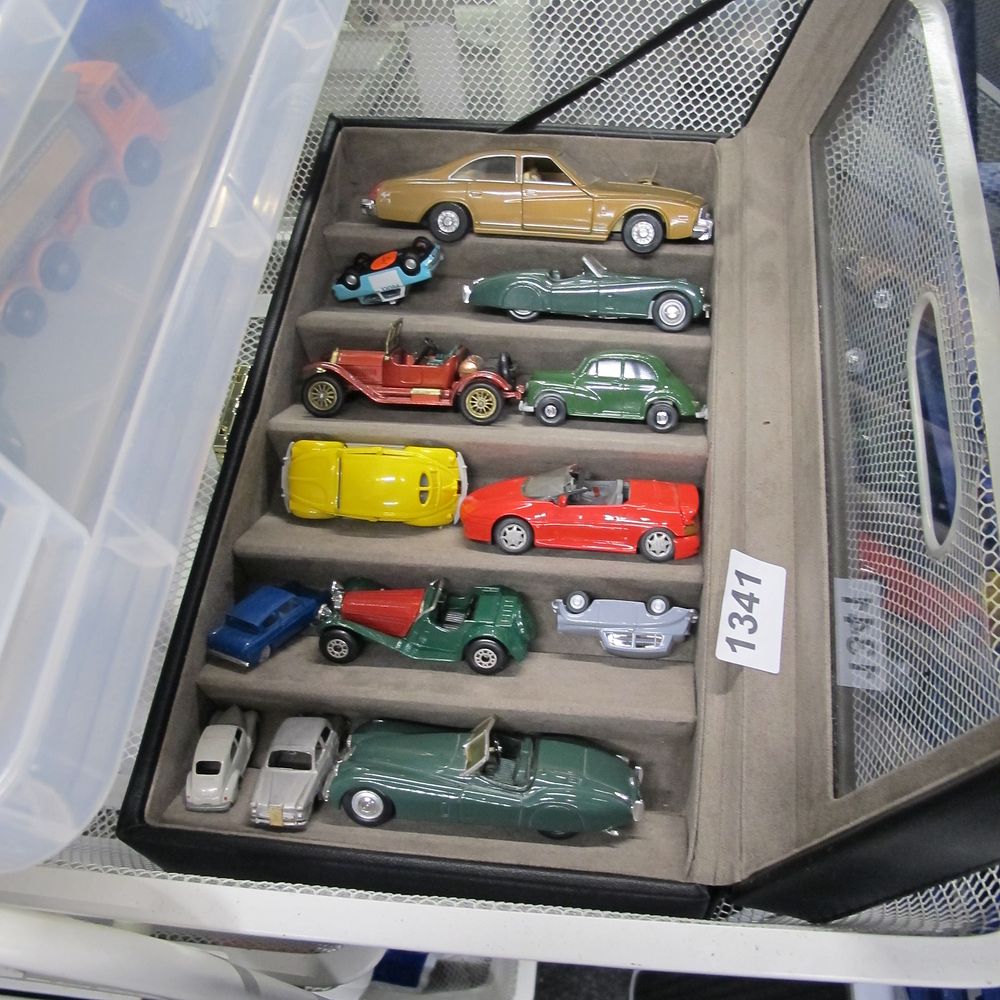Lot 1341: A Collection of Thirteen Miniature Die-Cast Model Vehicles...