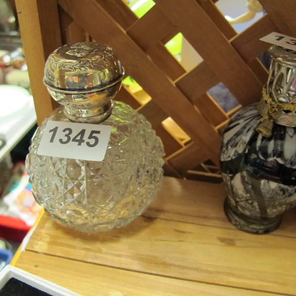 Lot 1345: A late Victorian silver-mounted cut glass scent bottle