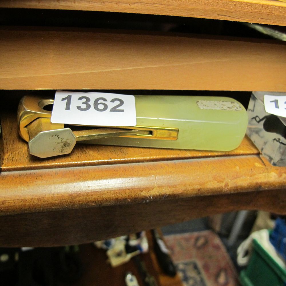 Lot 1362: A vintage lever-action desk cigar cutter with green...