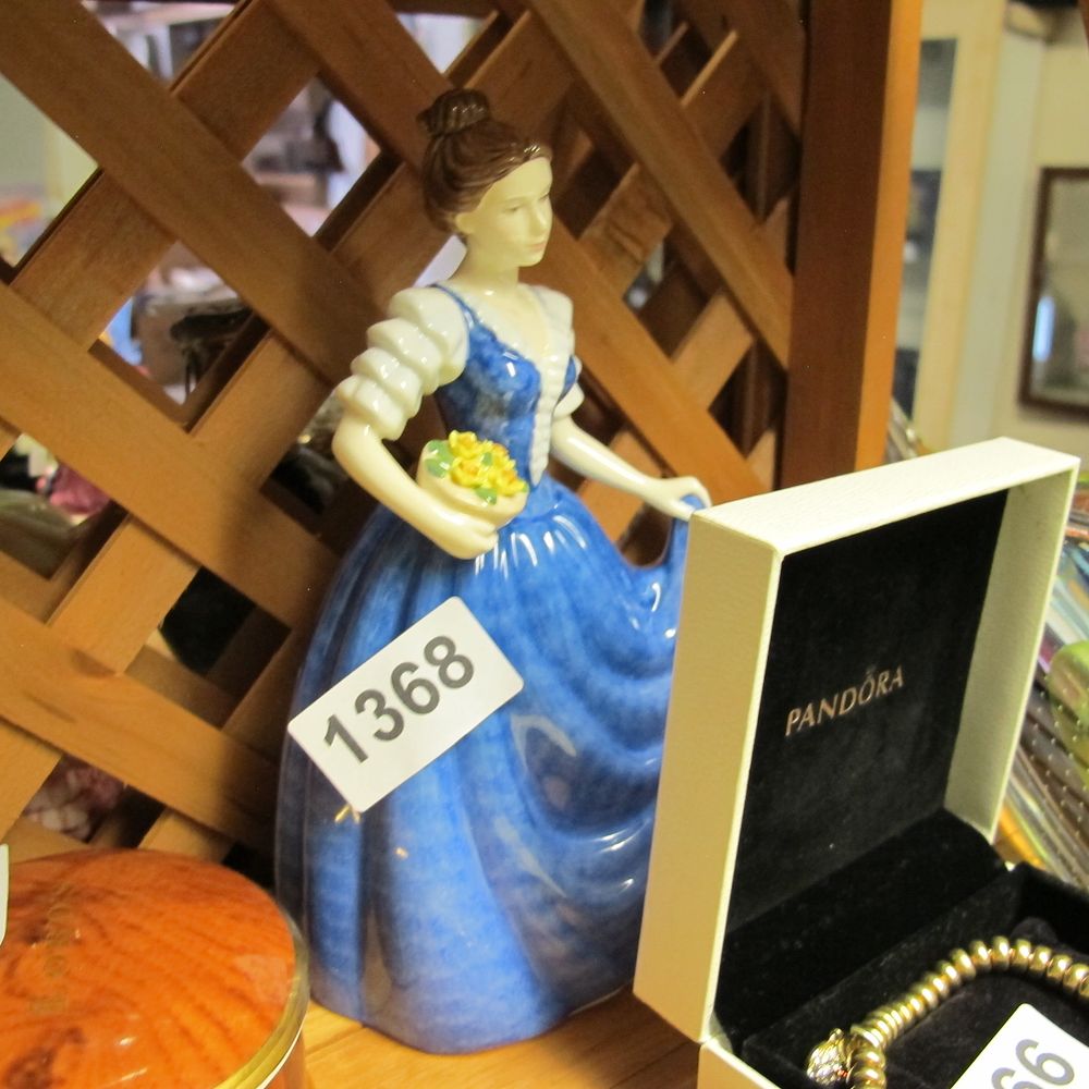 Lot 1368: A Royal Doulton porcelain figurine Helen HN3601