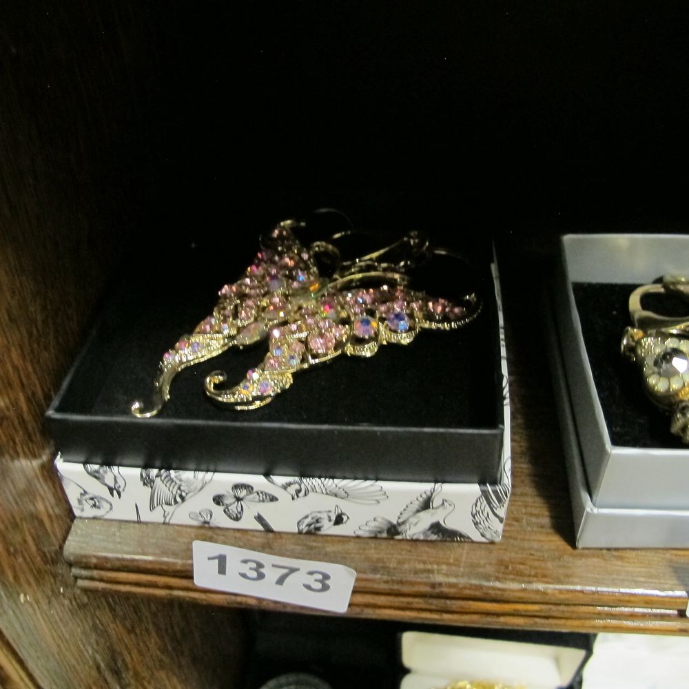 Lot 1373: A Large Gold-Tone and Multi-Coloured Crystal Butterfly Brooch