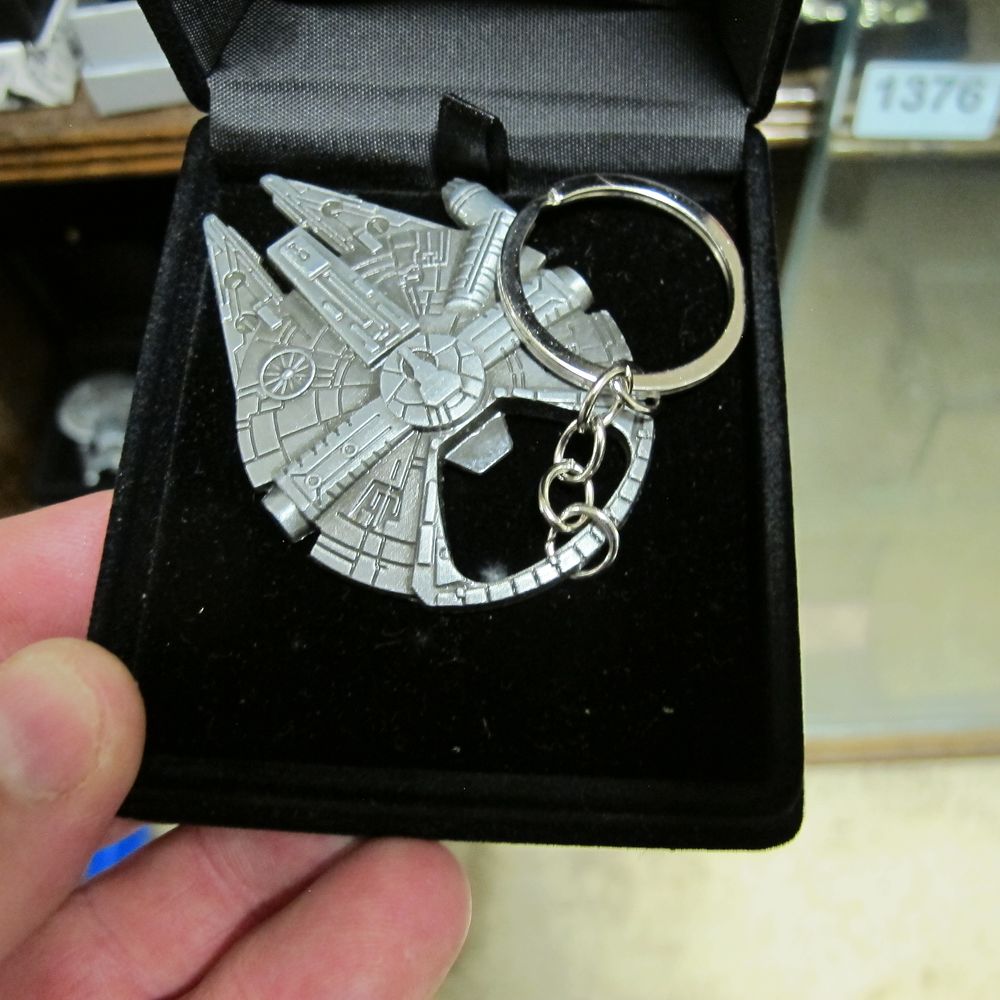Lot 1377: Star Wars Millennium Falcon Cast Metal Bottle Opener...